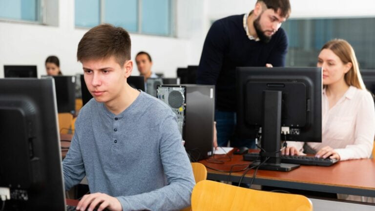Students testing on computers.