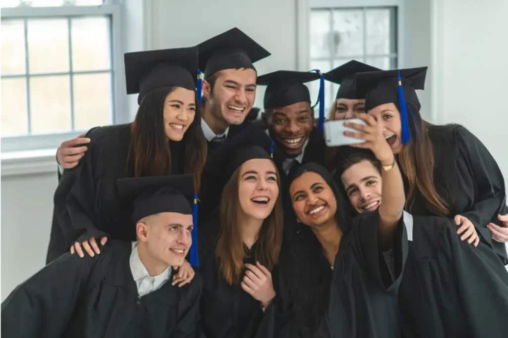 graduated students taking a selfie