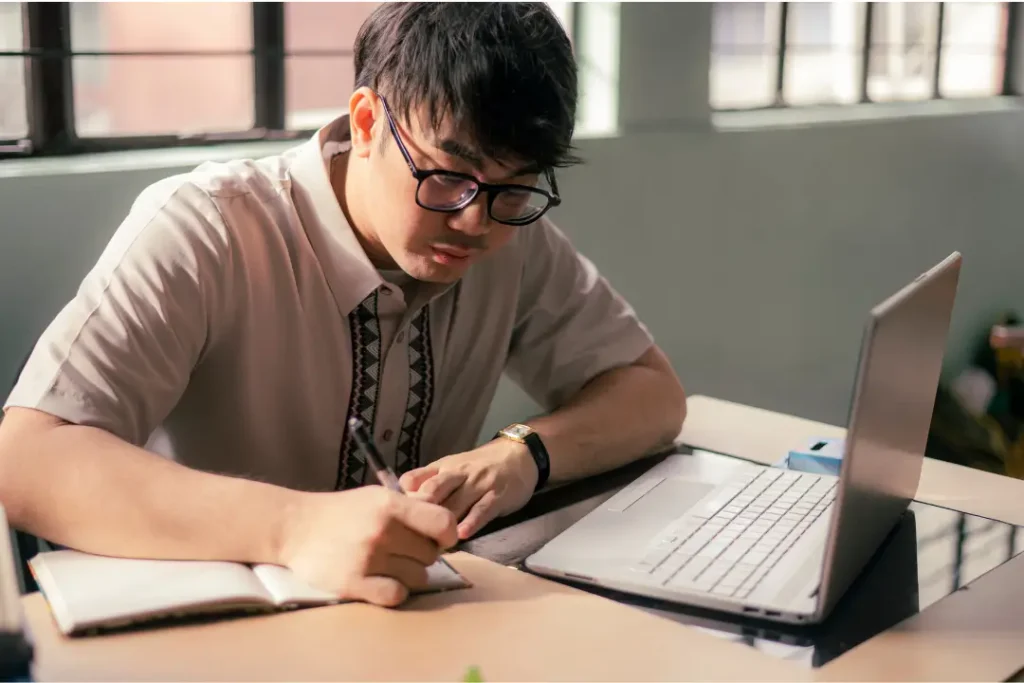 student working on georgetown supplemental essays
